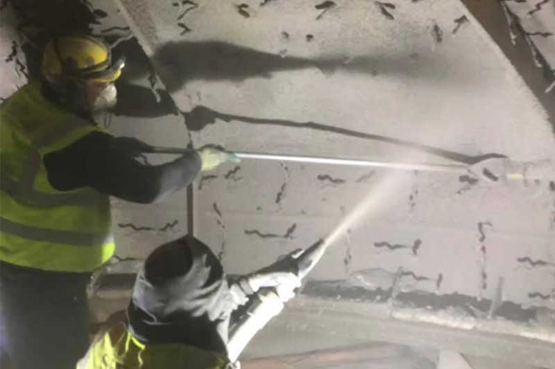 Gunning Our Material Onto A Vacuum Arc Degasser VAD Lid Within The Refractory Process